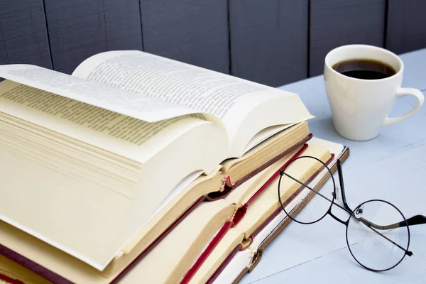 Open Old Books Glasses Coffee Cup Wooden Background — Stock Photo, Image