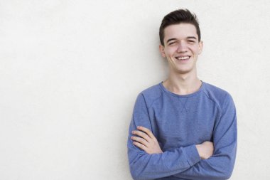Young portrait man looking at camera.