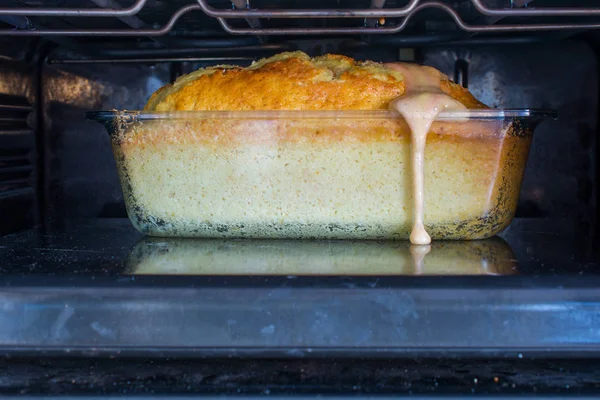 cake baked in the oven. well-bloated, overflowed