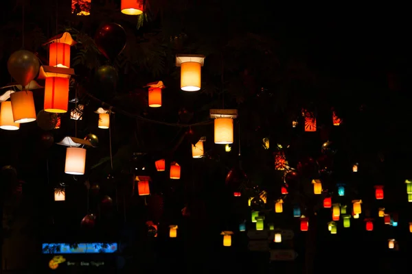 Adorned street trees. There are decorative balls, balloons, lamps and oil lamp. for Christmas, holidays and celebrations