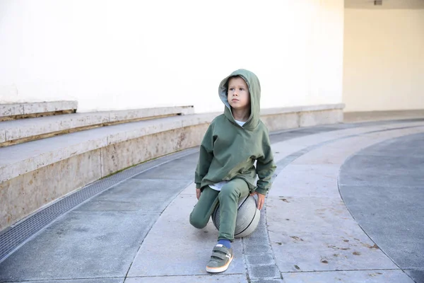 Cute Kid Hoodie Sitting Ball Park — Stock Photo, Image