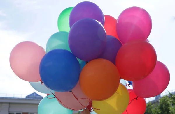 large bunch of colorful balloons in the sky