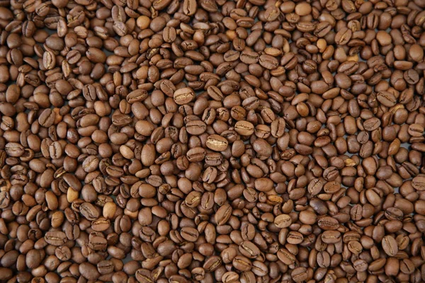 Ekologiskt Rostade Kaffe Korn Bakgrund Mönster Textur Kaffebönor Bakgrund Koncept — Stockfoto