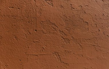 düzensiz sıva ile kırmızı duvar dokusu