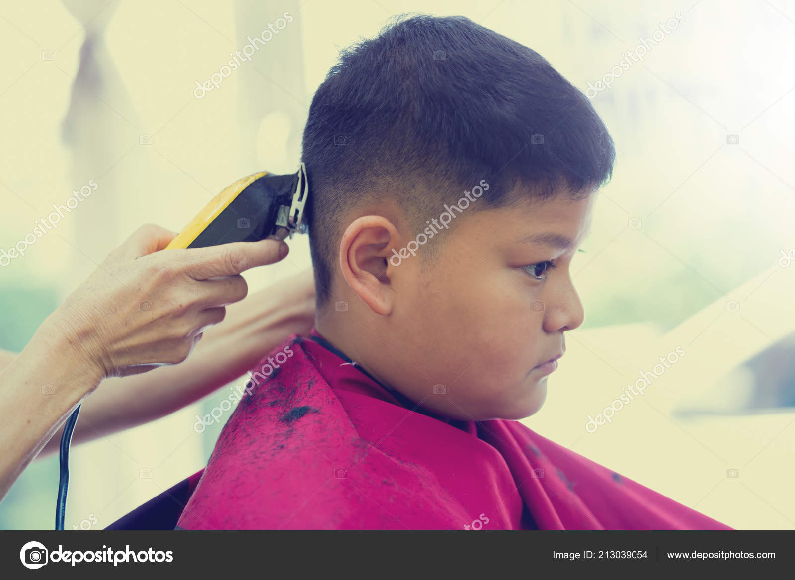Barber Shop Hairdresser Makes Hairstyle Asian Boy Hair Clipper