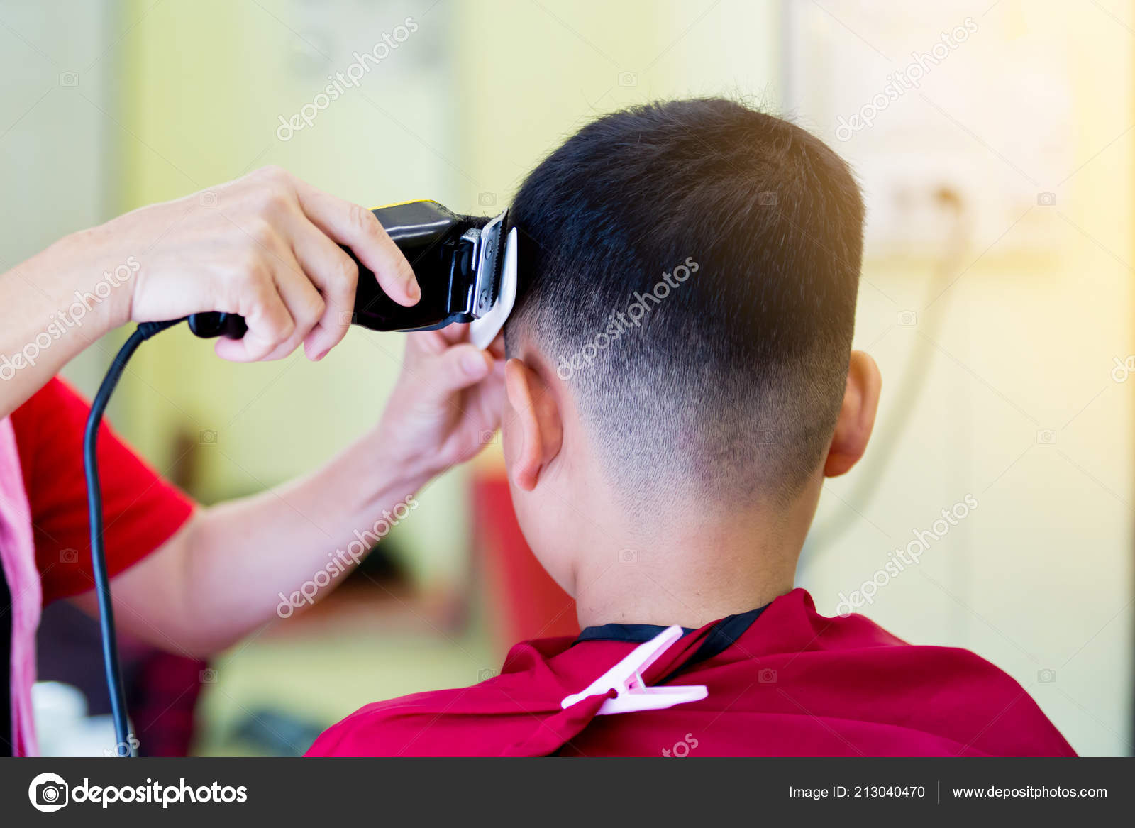 Barber Shop Hairdresser Makes Hairstyle Asian Boy Hair Clipper