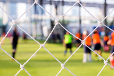 Beyaz örgü bulanık futbolcuların gol. futbol ya da futbol Akademisi.