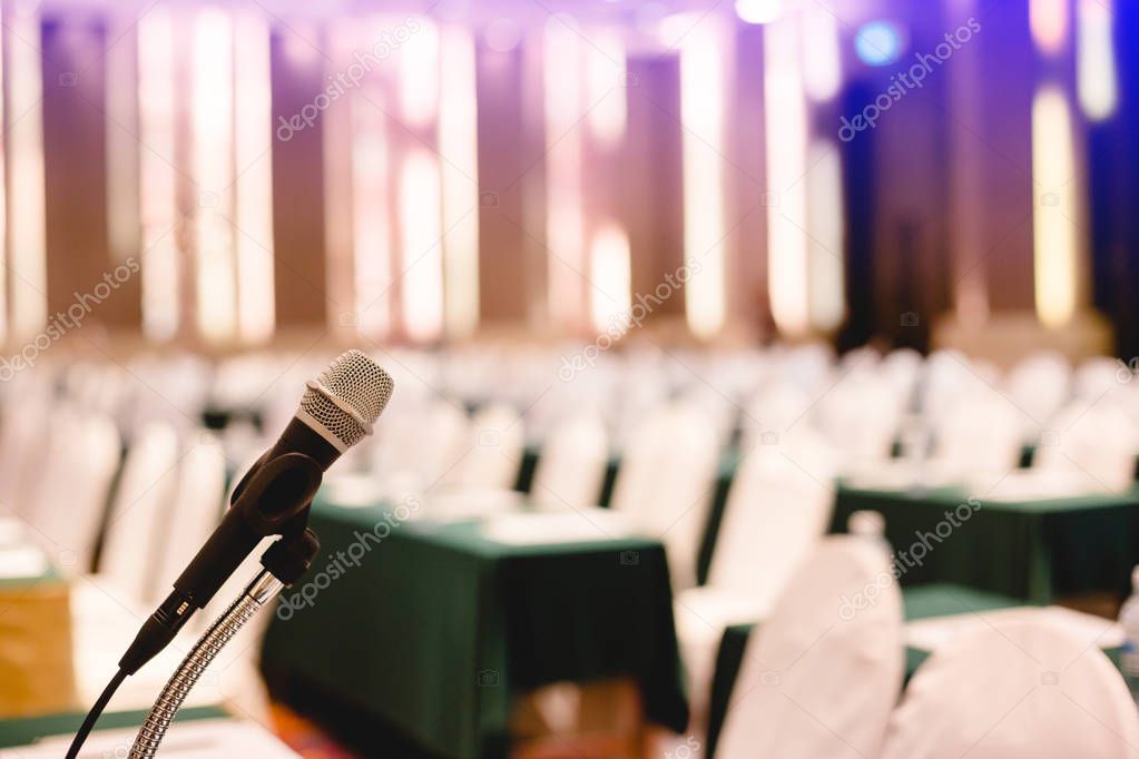 Microphone in an auditorium for shareholders' meeting or seminar event.