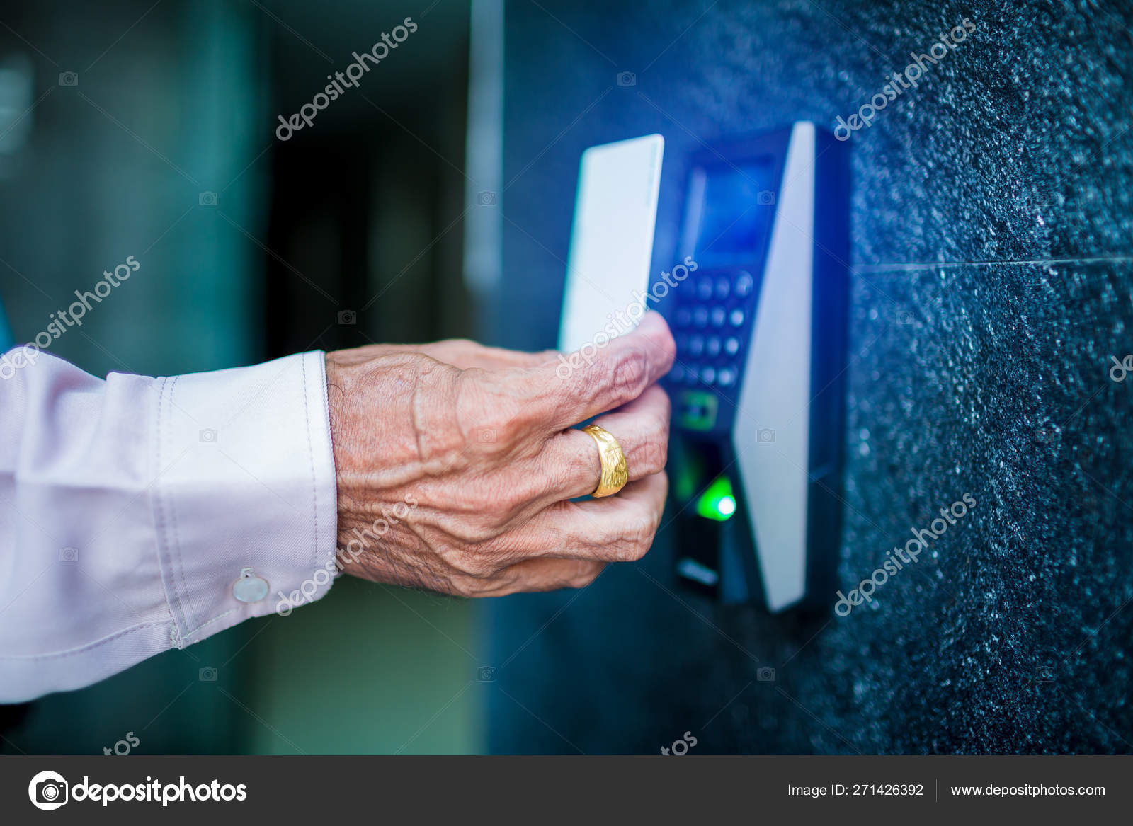 Door Access Control Staff Holding A Key Card To Lock And Unlock