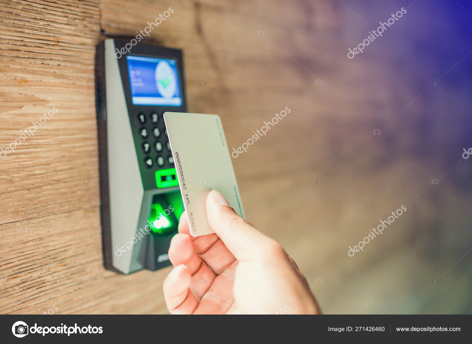 Door Access Control Staff Holding A Key Card To Lock And