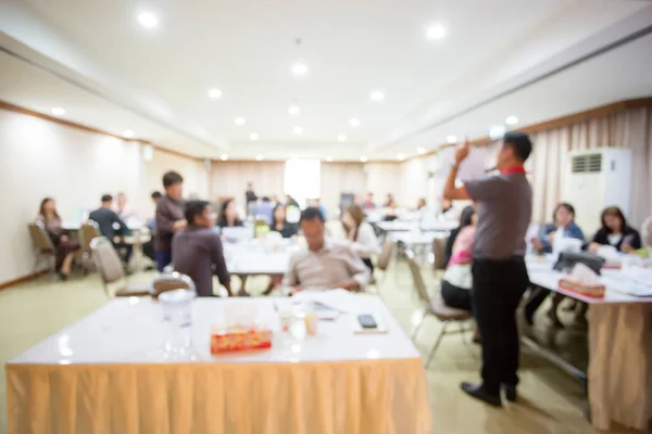 Blurry image. speaker or lecturer with startup business team bra — Stock Photo, Image