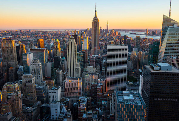 View of Manhattan skyline at sunset, New York City