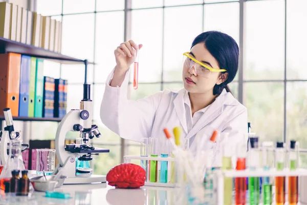 Scientists Experimenting Colorful Chemicals — Stock Photo, Image