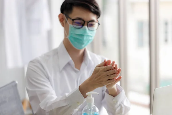 Young Asian Businessman Wearing Maskand Washes His Hands Alcohol Gel — Stock Photo, Image