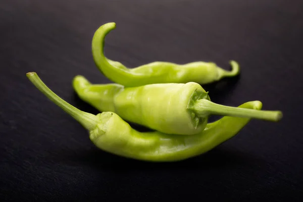 Banana pepper isolated on black