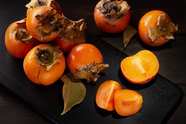 Persimmon Still Life Low Key Organic Kaki Fruit Harvested Autumn — Stock Photo, Image