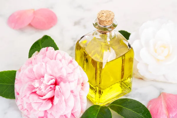 Camellia oil bottle for beauty, skin care, wellness and medicinal purposes