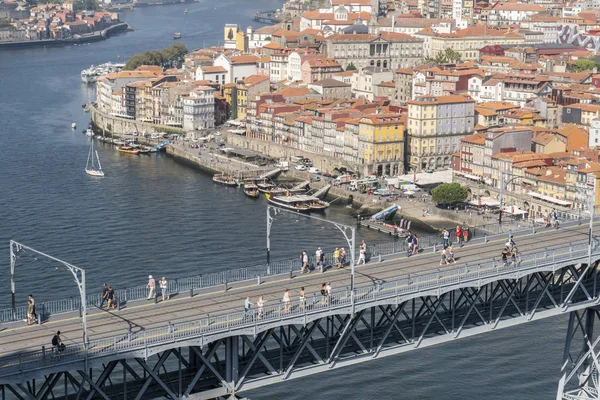 Dom Luis I Bridge view with subway train track and tourists — Stock Photo, Image
