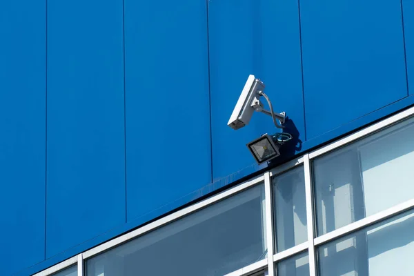 Security camera on building facade