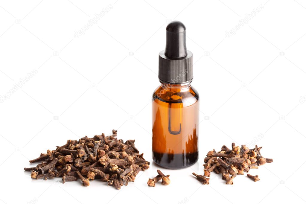 Clove essential oil isolated on white background