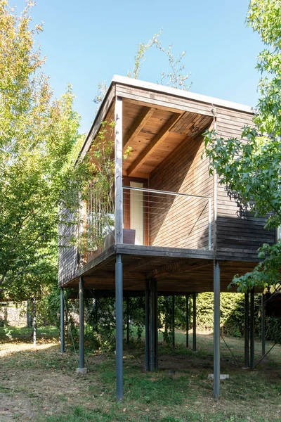 Modern elevated wood cabin facade