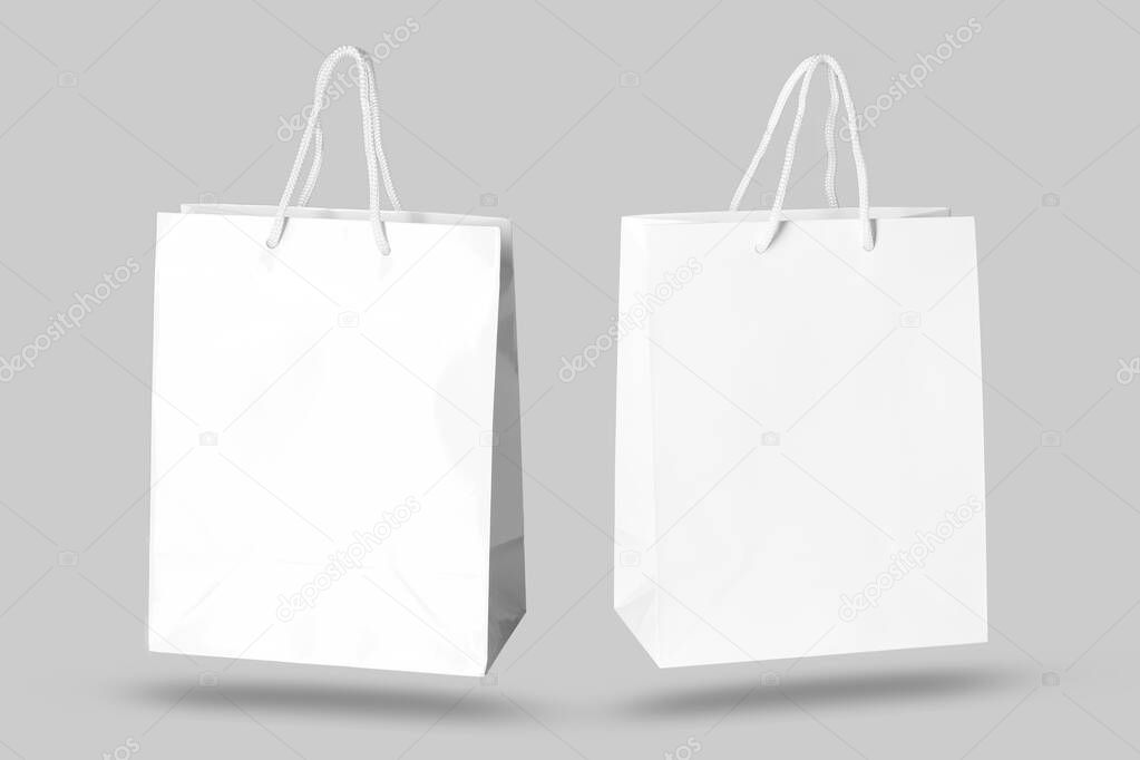 Mockup of paper shopping bag isolated on Gray background