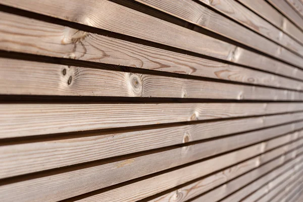 Close up of Wood paneling background texture. Modern ecological wooden facade thermal insulation