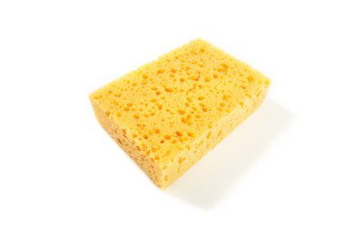Sarı sünger beyaz arkaplanda izole edildi