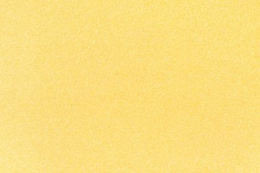 Altın parıltılı soyut arkaplan dokusu. Noel ve parti tasarımları için mükemmel.