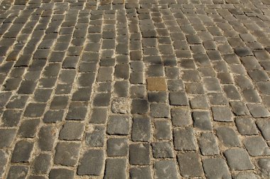 Taş kaldırım dokusu. Granit cobblestoned kaldırım arka plan. Arka plan eski kaldırım taşı kaldırım yakın çekim. Sorunsuz doku