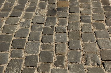 Taş kaldırım dokusu. Granit cobblestoned kaldırım arka plan. Arka plan eski kaldırım taşı kaldırım yakın çekim. Sorunsuz doku