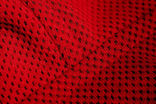 Red sportswear closeup top view. seam and juncture. breathable knitwear. clothing details macro — Stock Photo, Image