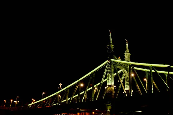 Budapest Hungary, 05.29.2019 glowing liberty bridge across the Danube River. night Budapest glowing in gold — Stock Photo, Image