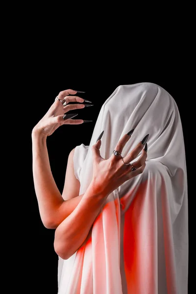 A woman covered with white cloth with a closed face suffers. faceless pain. long black nails on thin female fingers. emotion without facial expressions — Stock Photo, Image