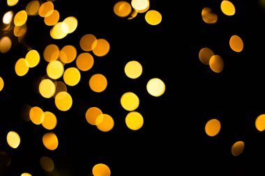 Bokeh 'te parıldayan yıldızlar. Noel arkaplanı