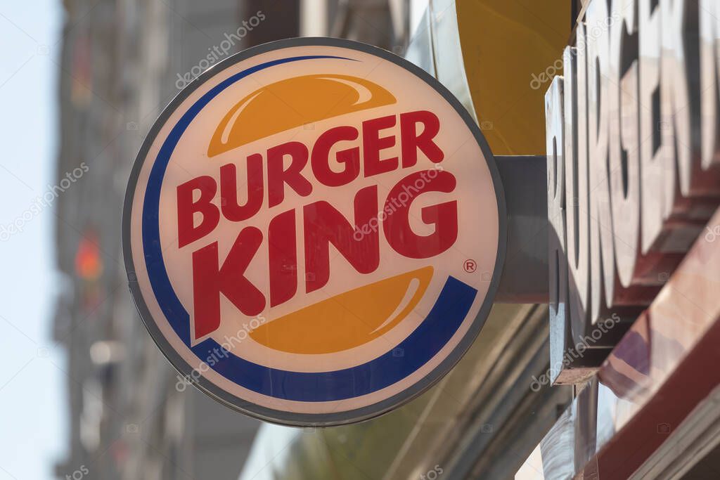 Madrid, Spain - May 18, 2020: Main access area to the fast food and hamburger restaurant, Burger King, in the Retiro district, Ibiza street.