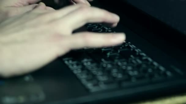 Young man typing on his laptop. — Stock Video