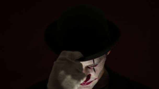 Terrible Man Clown Makeup Takes His Hat Welcoming His Victim — Stock Video