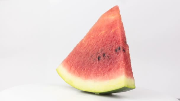 Slice Ripe Watermelon Rotates Plate Close Watermelon Pulp Seeds — Stock Video