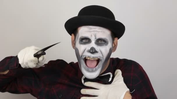 Horrible Man Clown Makeup Threatens His Victim Sharp Knife Scary — Stock Video