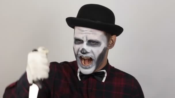 Horrible Man Clown Makeup Threatens His Victim Sharp Knife Scary — Stock Video