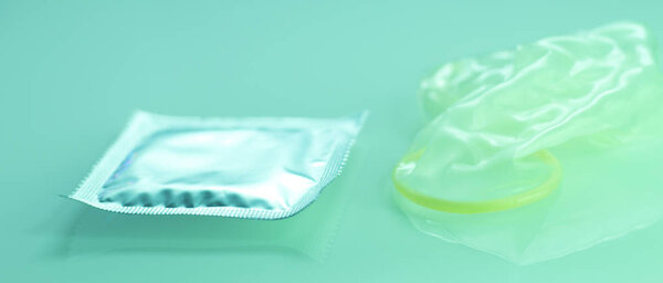 Rubber latex condom male contraceptive for safe disease and pregnancy free sex.