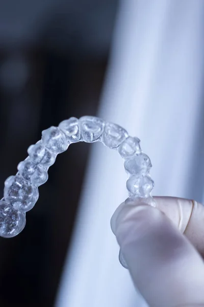 Invisible dental teeth aligners brackets used to align each tooth in cosmetic dentistry for patients.