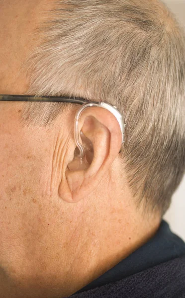 Man with hearing aid