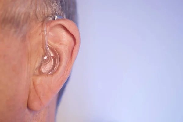 Man with hearing aid