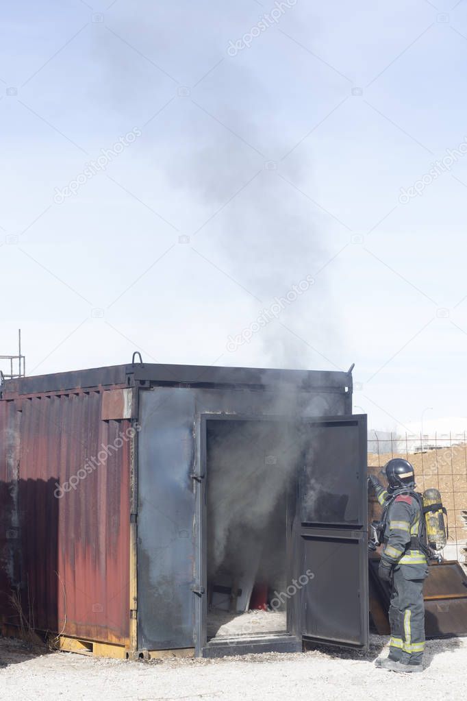 Fireman fire training station drill