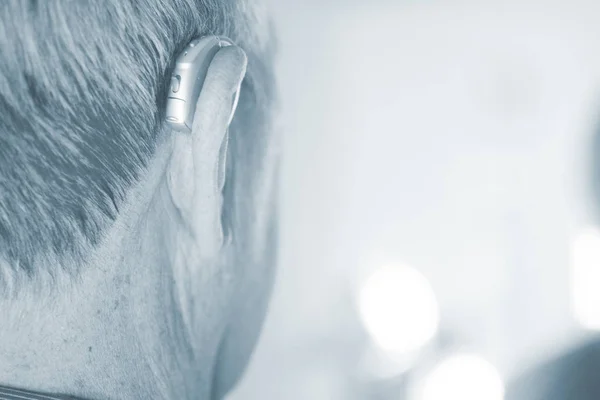 Man with hearing aid