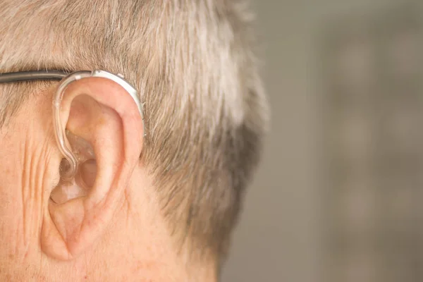 Man with hearing aid