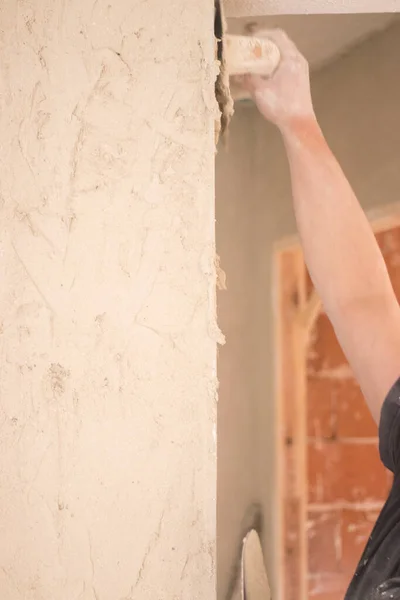 Building renovation works in appartment showing refurbishments works by builders to renovate walls.