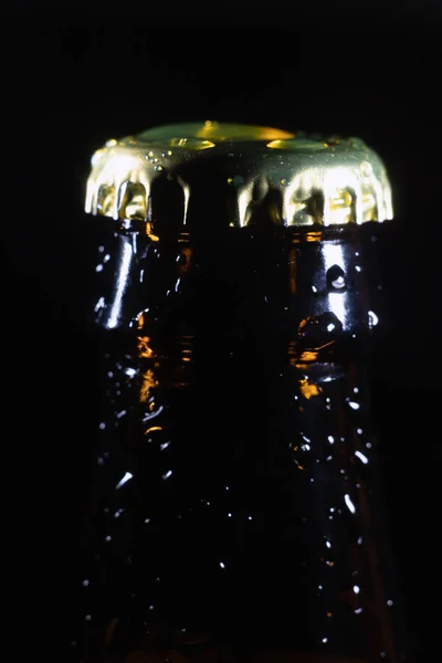 Ice beer bottle with lid close-up